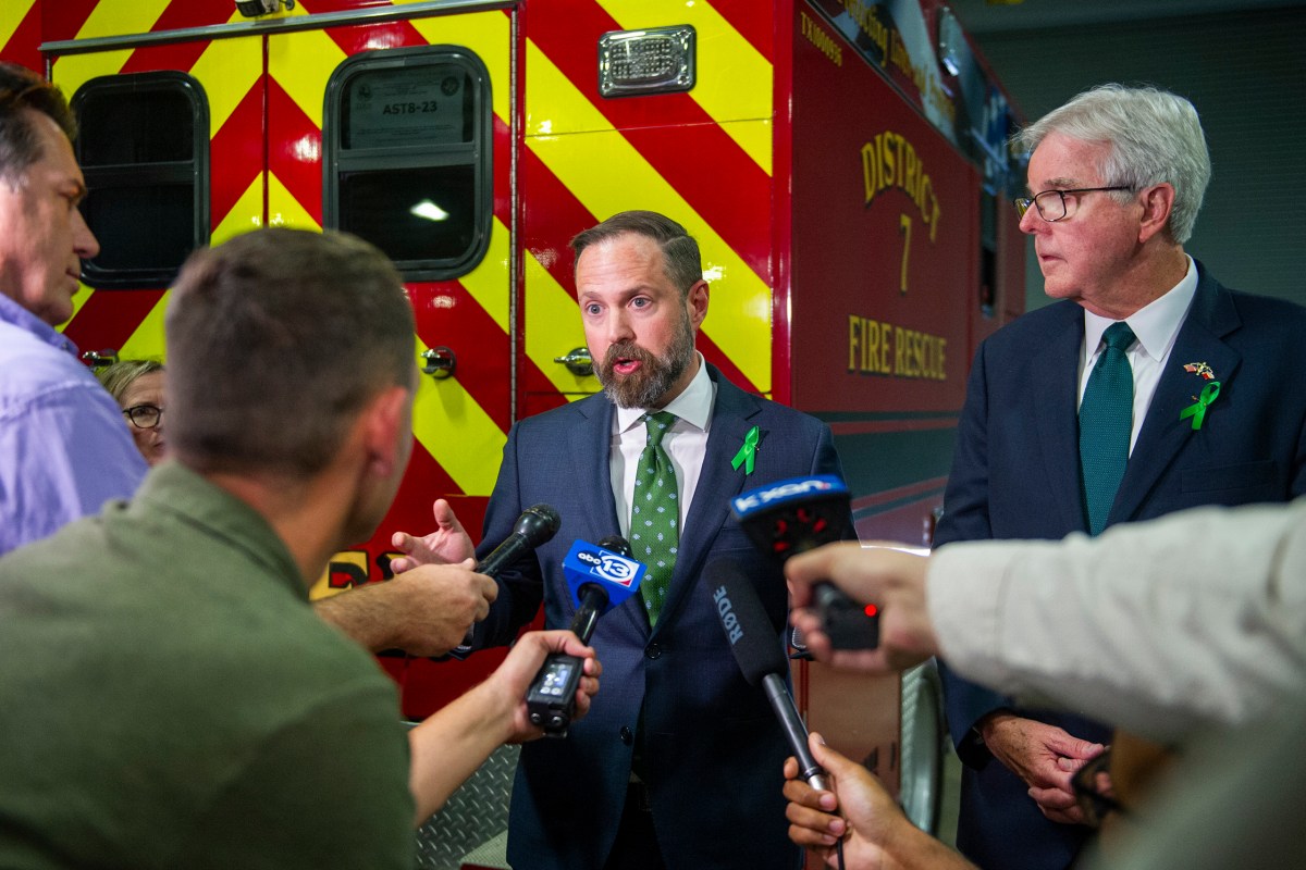 Speaker of the House Dustin Burrows, R-Lubbock and Lt. Gov. Dan Patrick speak at a press conference in Kerrville on July 31, 2025.