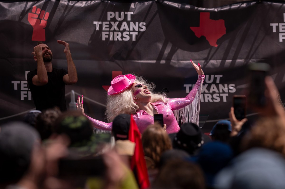 Drag Queen Brigitte Bandit performs during a Fight The Trump Takeover Rally at the south side steps of the Capitol on Aug. 16, 2025.
