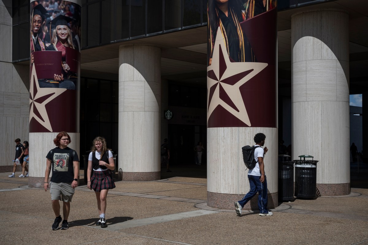 Students walk past the Alkek Library at Texas State University on Sept. 2, 2025, in San Marcos.