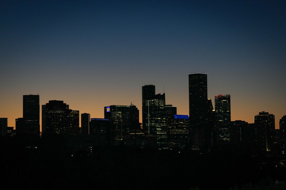The sun sets behind downtown Nov. 9, 2025, in Houston. Waller County, just northeast of Houston, was the fastest-growing county in the state and the second-fastest-growing county in the country between July 1, 2024, and July 1, 2025.