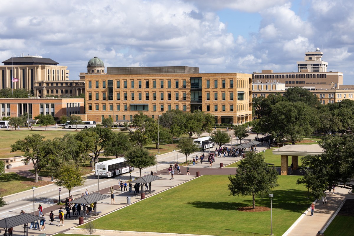 Students walk down Lamar Street on the Texas A&M University campus in College Station on Nov. 13, 2025.
