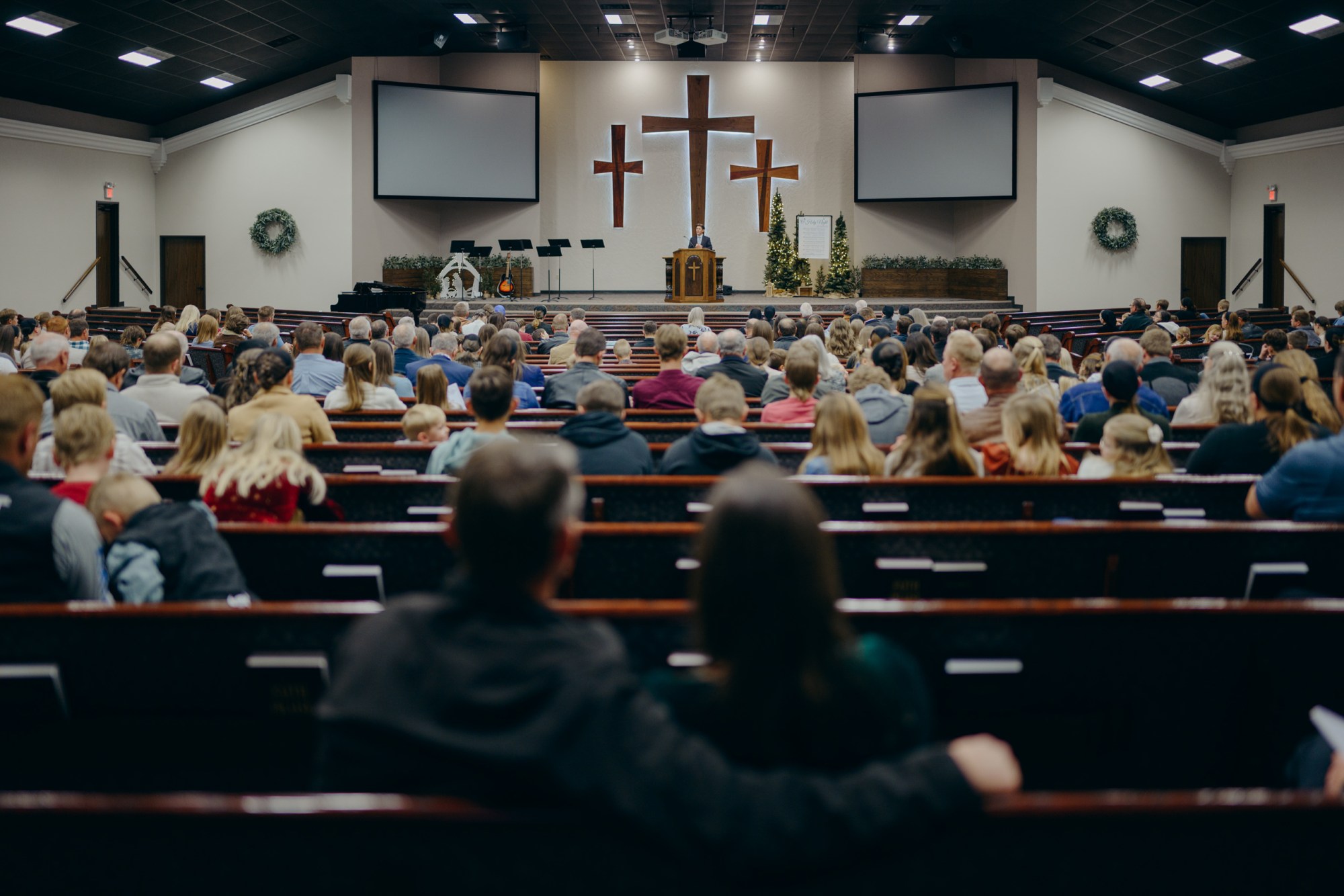 John and Tina Peters sit together during the German service at the Mennonite Evangelical Church in Seminole on Nov. 30, 2025.