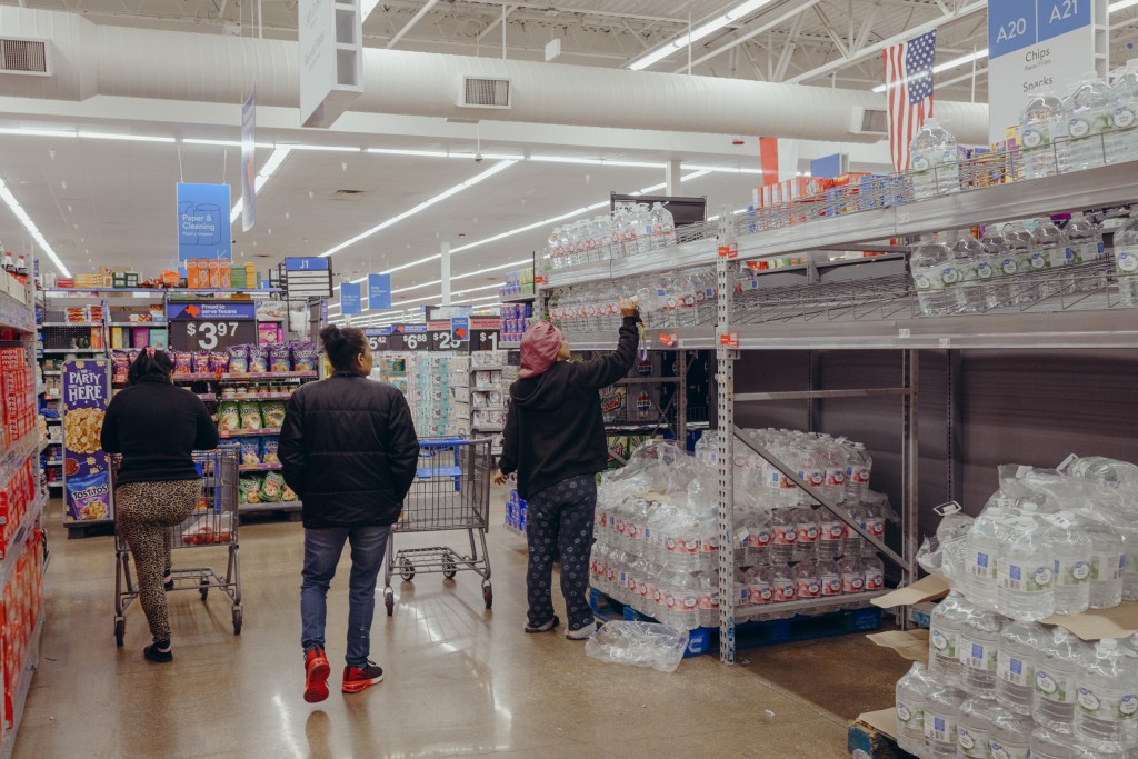Austinites gathered supplies for the winter freeze at a Walmart on Friday.