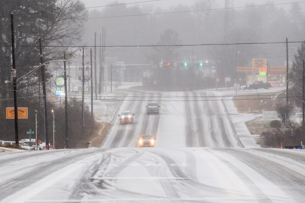 Icy roads in Longview on Saturday. East Texas was hardest hit by the storm, suffering the largest number of power outages.