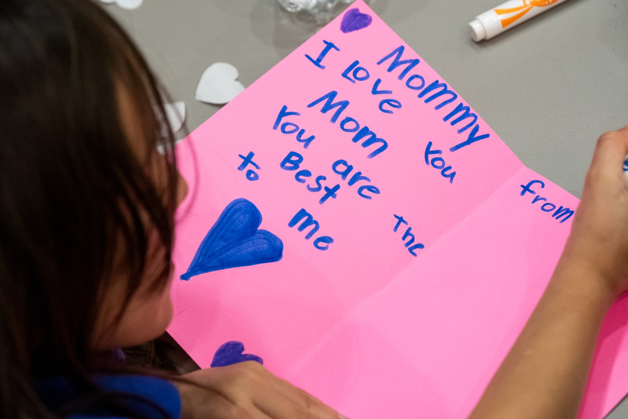 Meg Martinez spends her evening making Valentine's cards as her mothers attend a SHINE community support group meeting for mothers at Marvin Methodist Church in Tyler.