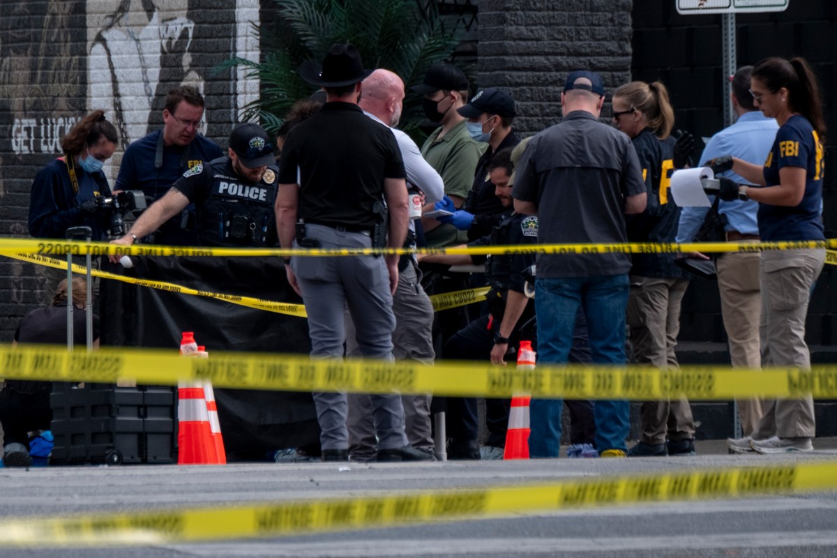 FBI and local law enforcement personnel collect evidence at the scene of the West Sixth Street shooting in Austin on March 1, 2026.
