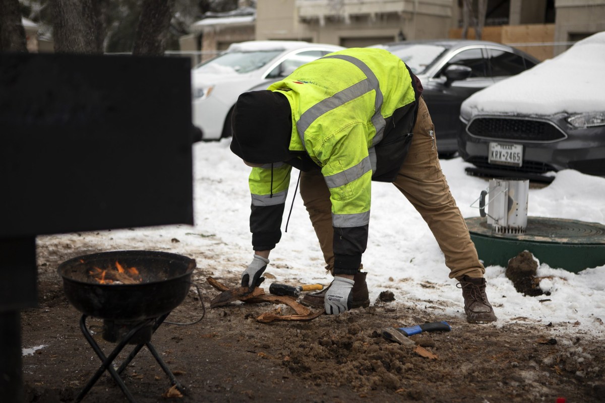 Jacob Duran cooked his meals outside last week after his apartment lost power in Southeast Austin.
