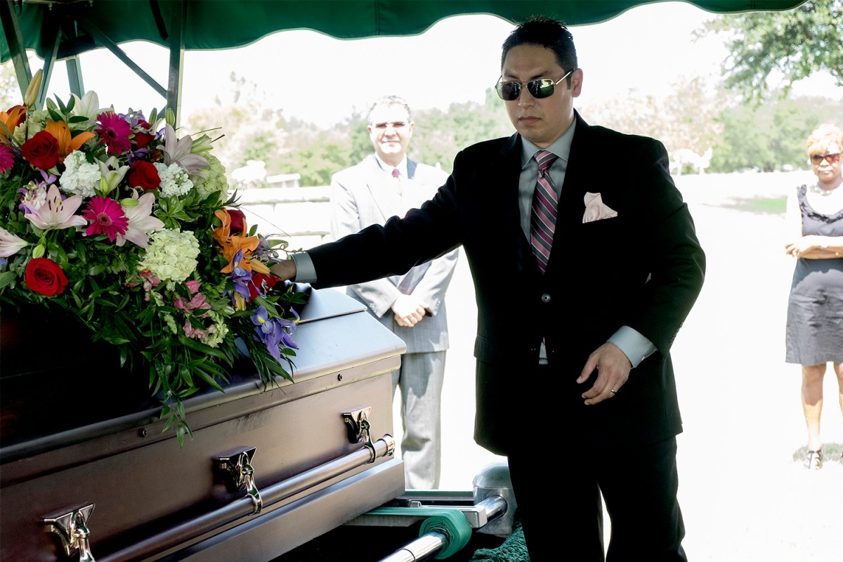 Chris Zavala mourns the loss of his wife, Michelle Zavala, during her funeral service at Cook-Walden/Capital Parks Funeral Home in Pflugerville on Aug. 5, 2017. Michelle died a week after giving birth to their daughter, Clara.